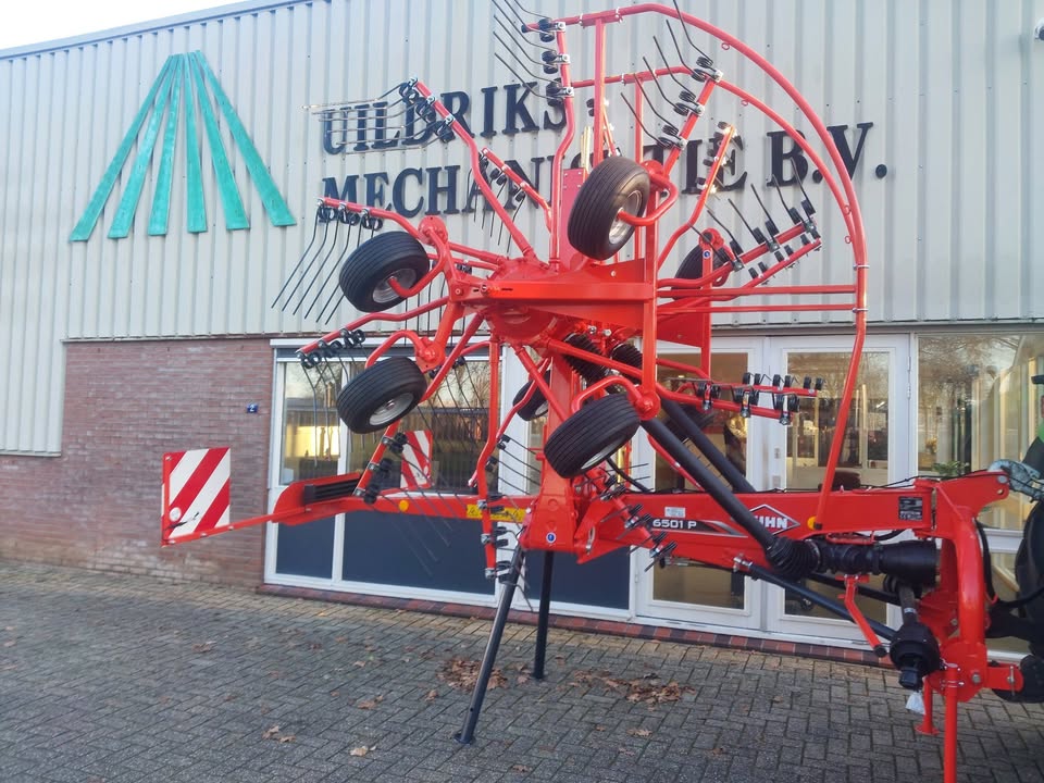  Deze nieuwe Kuhn hef gedragen